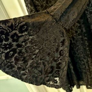 Black Lily Rose Velvet above the knee dress with beautiful flare sleeve.